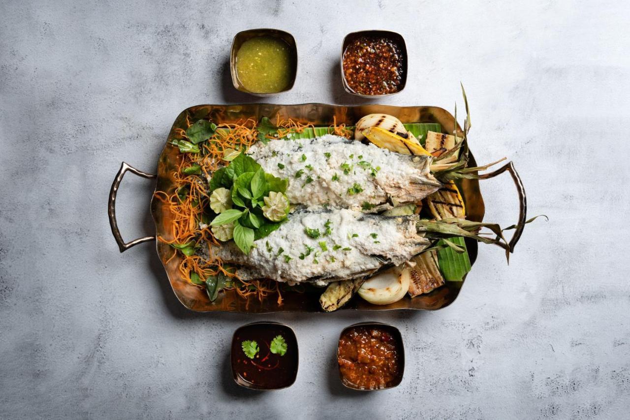 The Ritz-Carlton, Kuala Lumpur Hotell Exteriör bild A dish of Thai-style grilled grouper